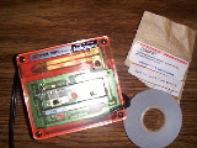 Picture of sparker timer, paper, and package paper