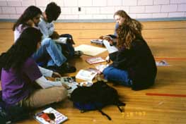 Jr. and Sr. girls working on ideas for posters